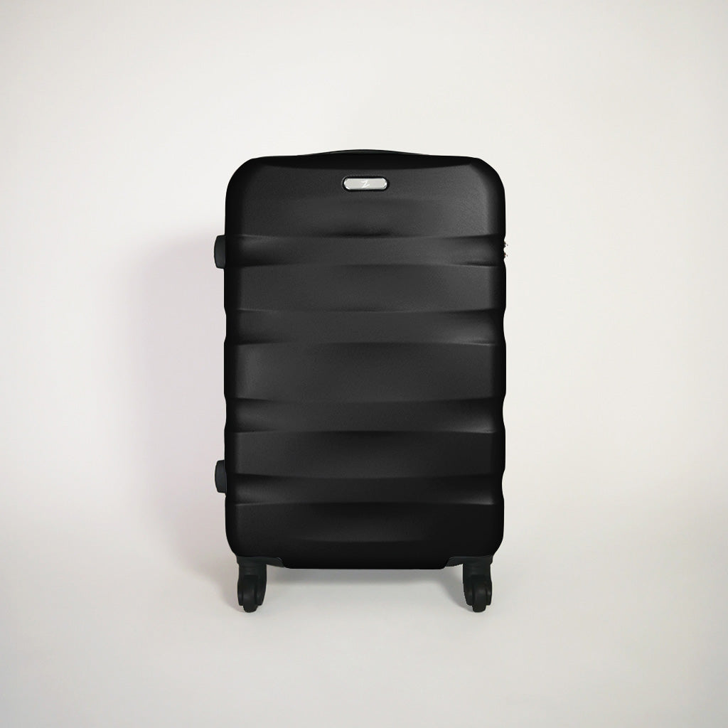 Fronte valigia nera rigida del set trolley 4 ruote