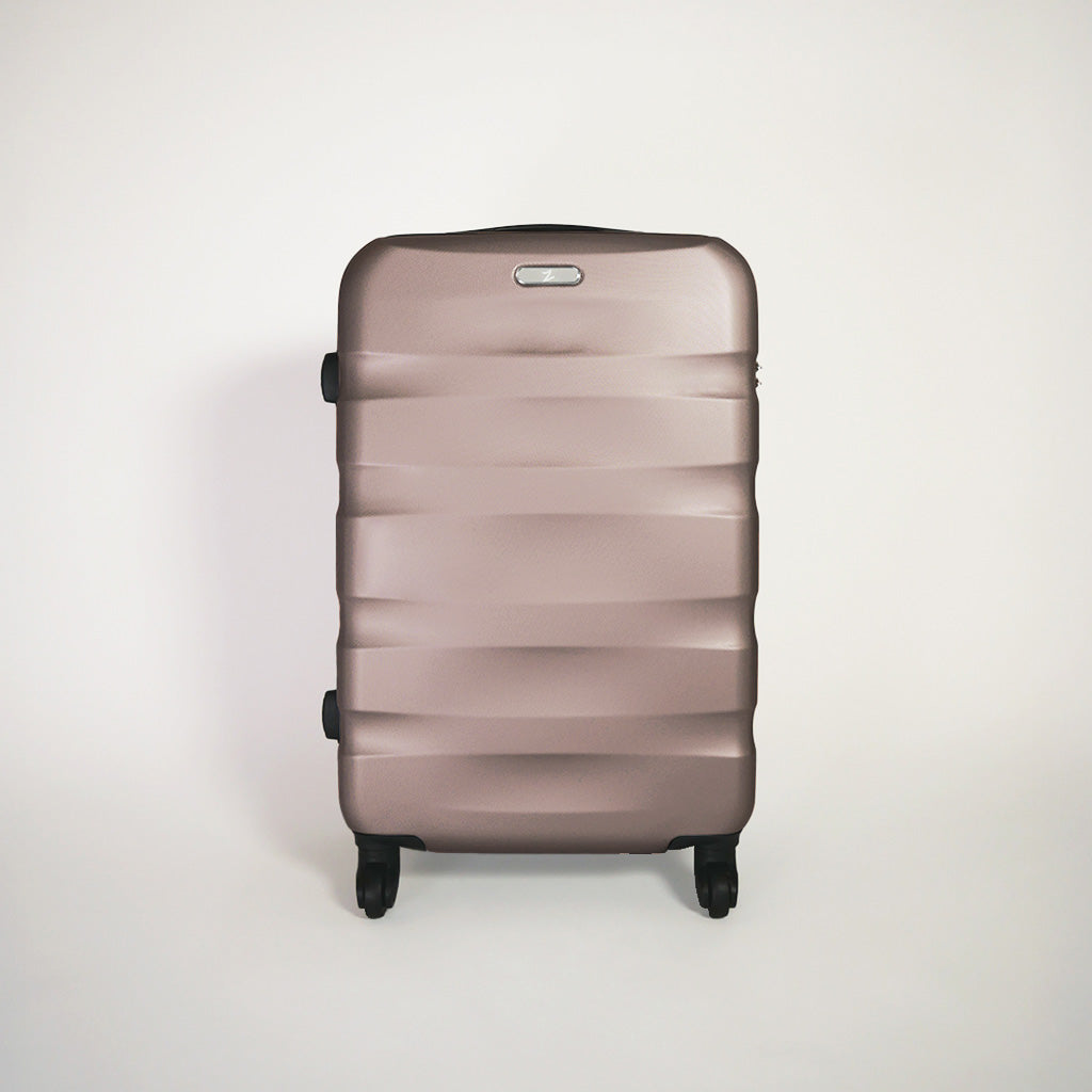 Fronte valigia oro rosa rigida del set trolley 4 ruote