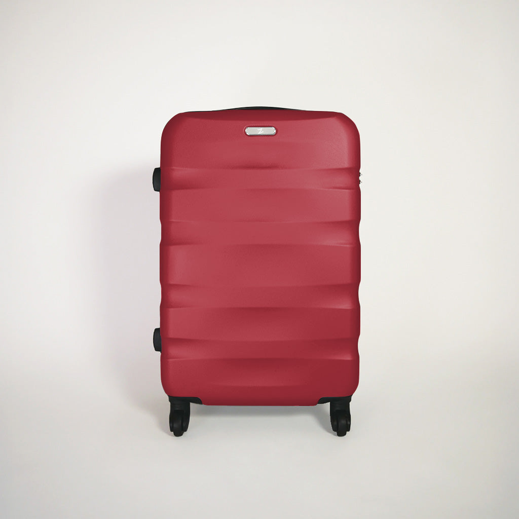 Fronte valigia rossa rigida del set trolley 4 ruote